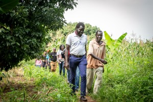 farmer-showing-mandulis-energy-director-his-farm