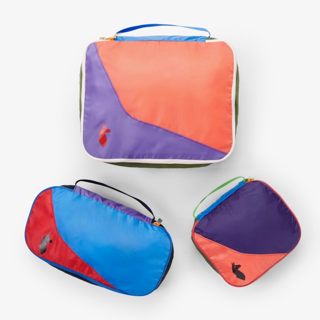 A colorful assortment of Cotopaxi's Cube packing cubes
