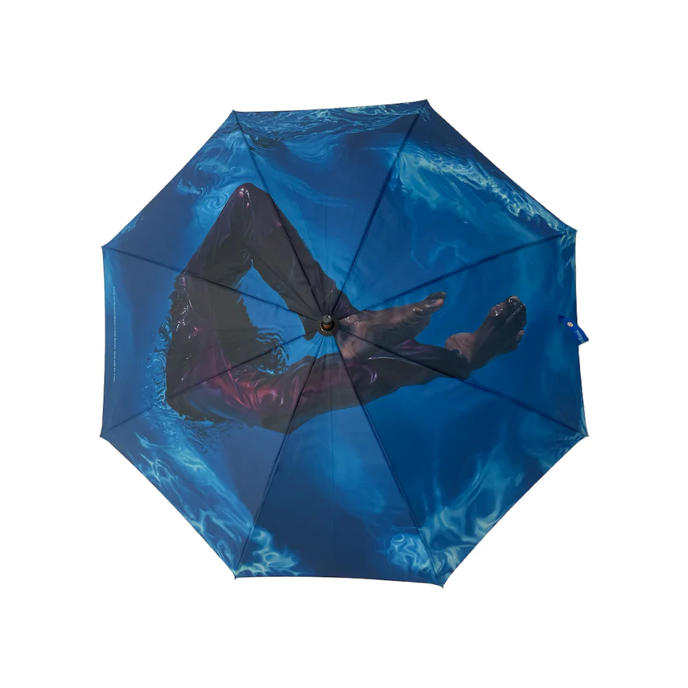 The top view of an umbrella featuring one of Calida Rawles water portraits