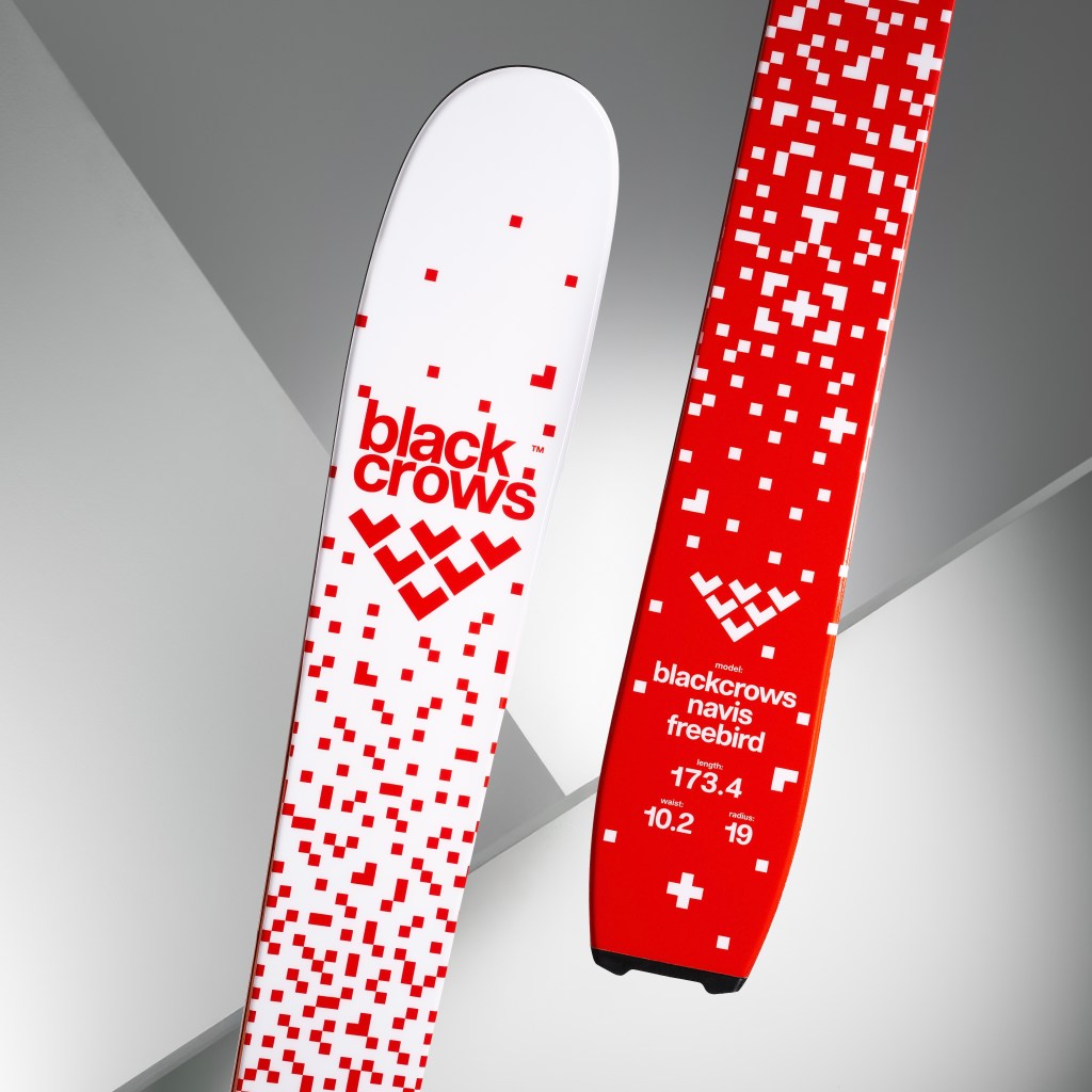 The front and back of the blackcrows's limited edition Navis Freebird skis in red and white