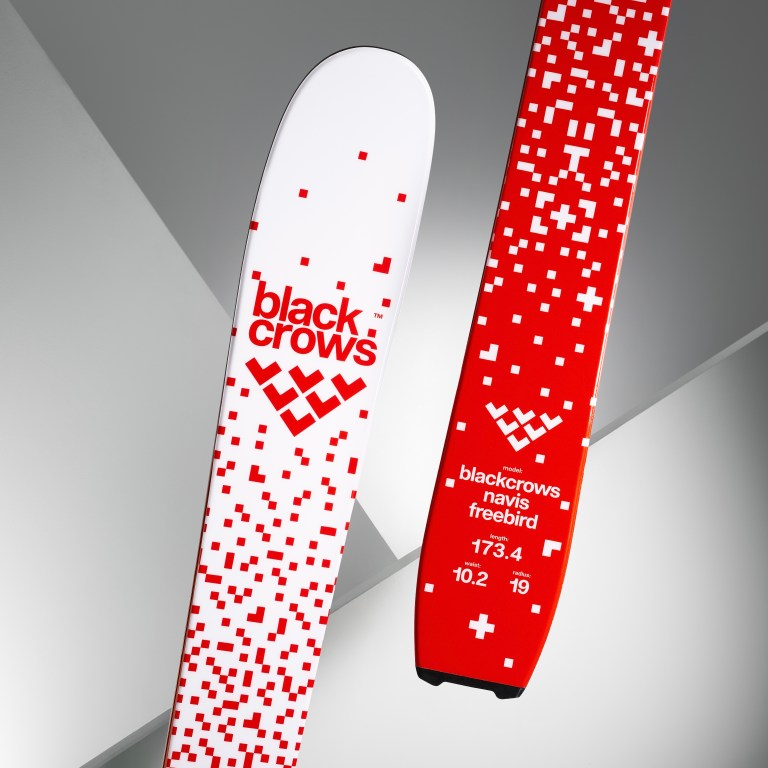 The front and back of the blackcrows's limited edition Navis Freebird skis in red and white