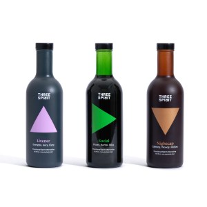 Three dark glass bottles