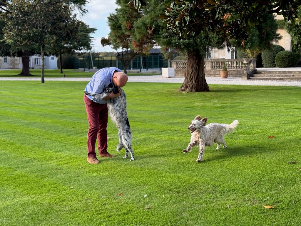 Bruno Borie with two of his dogs on the property