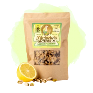 A brown paper bag with a colorful label and a window to see the granola