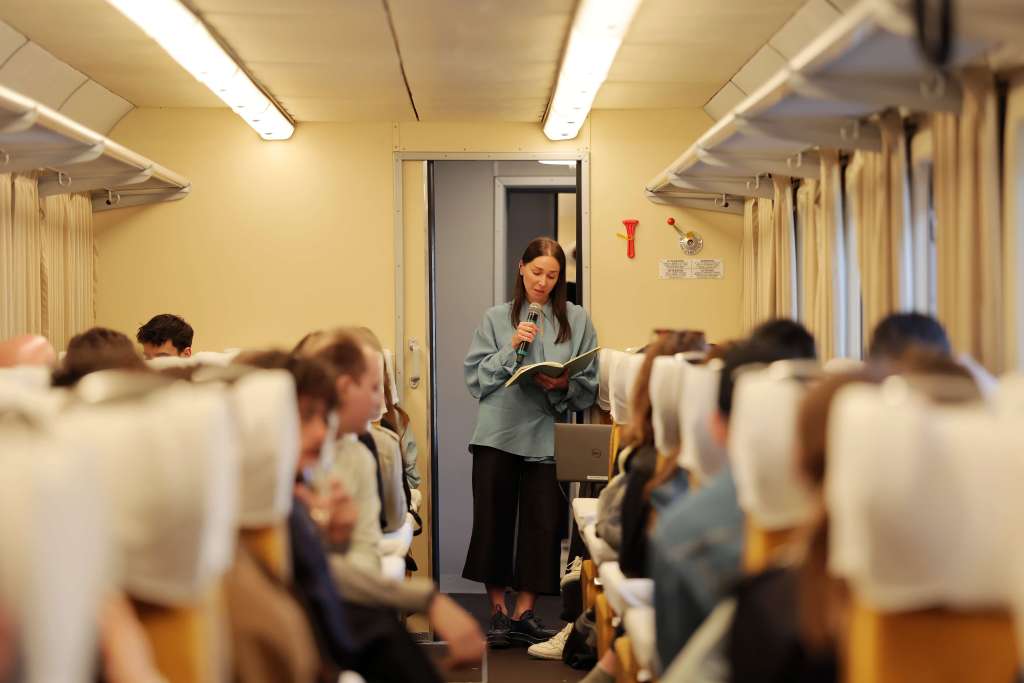 Natalia Grabowska speaks on a train as part of Prada Frames's program at Milan Design Week