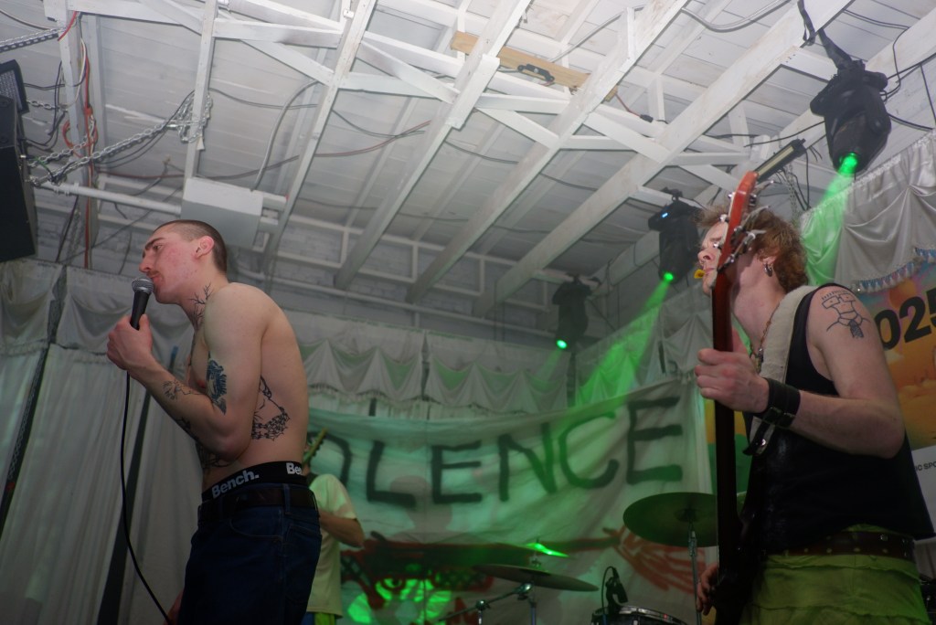 Two members of Truck Violence performing on stage at SXSW 2025