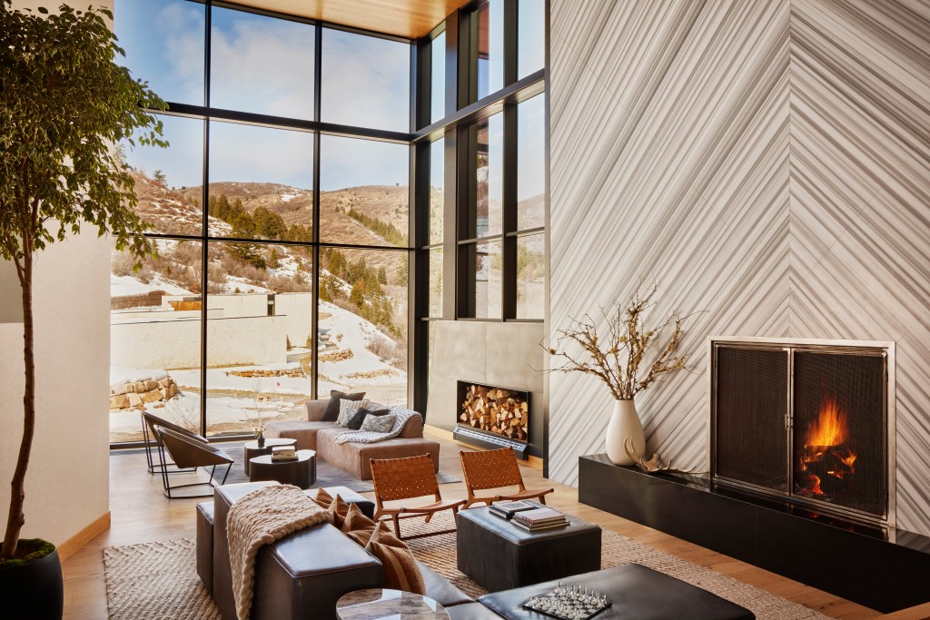 living room with high ceiling and beautiful view