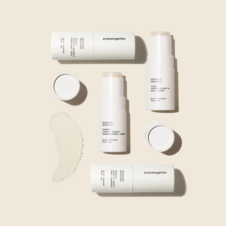 A set of four EvolveTogether's travel deoderants on a plain background