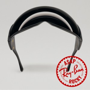 A pair of Ray-Ban sunglasses in black designed by A$AP Rocky on a plain background