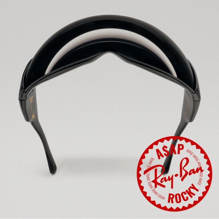 A pair of Ray-Ban sunglasses in black designed by A$AP Rocky on a plain background
