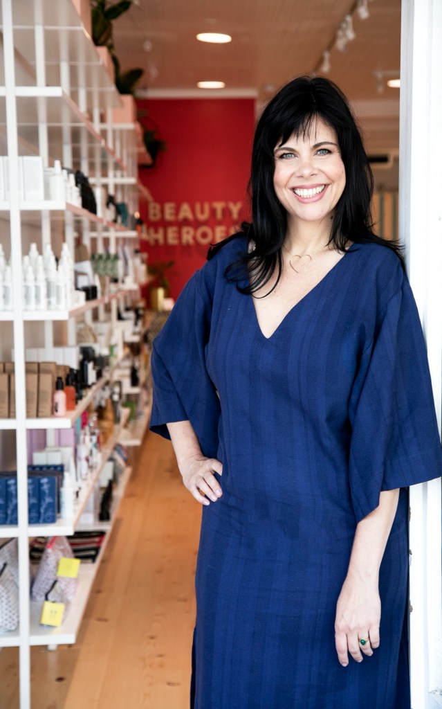 Beauty Heroes Jeannie Jarnot standing in her store.