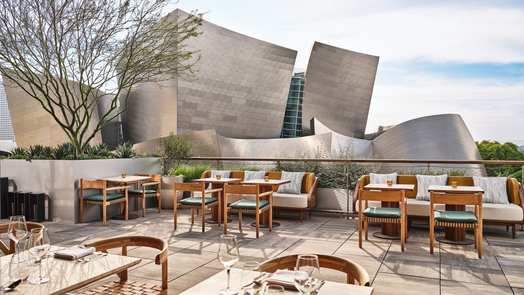 Exterior view of the San Laurel patio with the Disney Hall in the background.