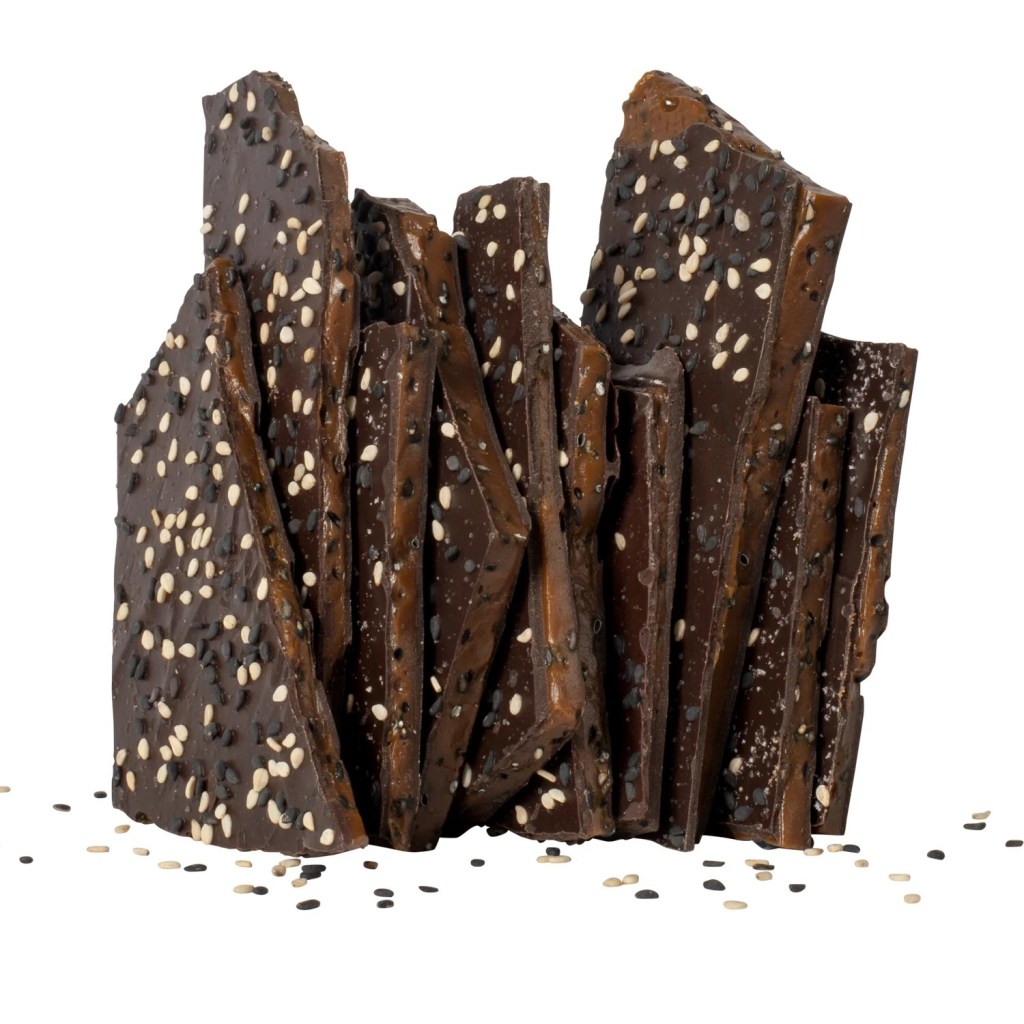 Pieces of NeoCocoa's black sesame toffee brittle made with Dandelion Chocolate's 70% chocolate