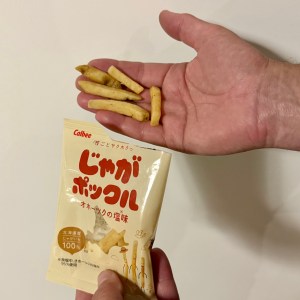 Calbee Hokkaido Potato Sticks in a hand