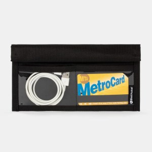 SLNT's Faraday bag for phones is shown closed, with its two external pockets showing