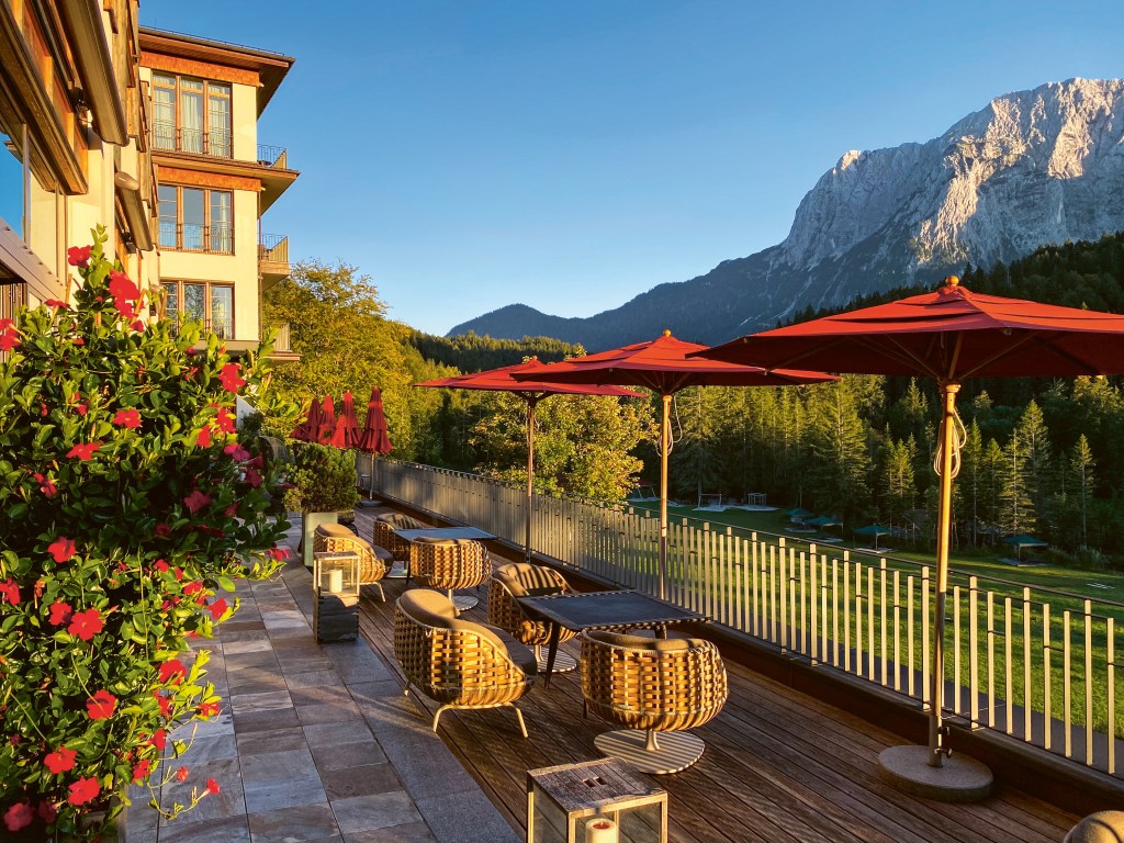 The terrace at the Schloss Elmau's Retreat hotel with mountain views.