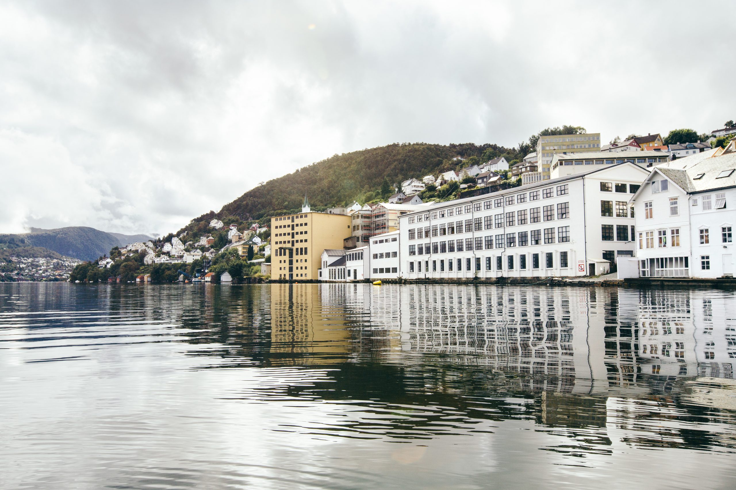 An exterior view of Oleana's factory on the fjord.