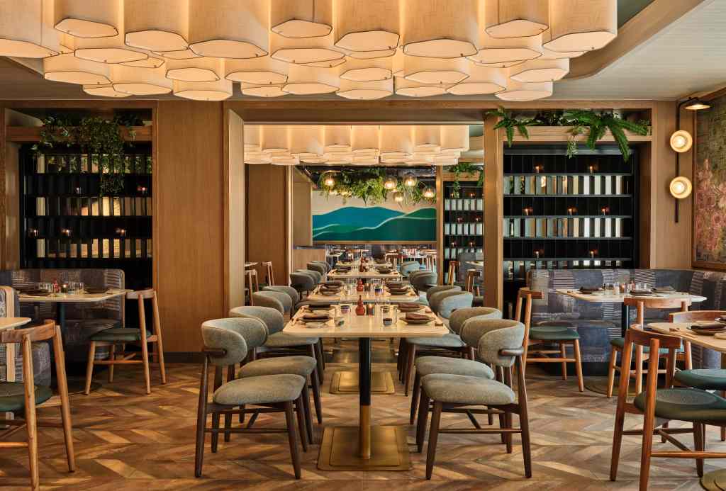 The dining room at 855-ALOHA, Romer House Waikiki's on-site restaurant.