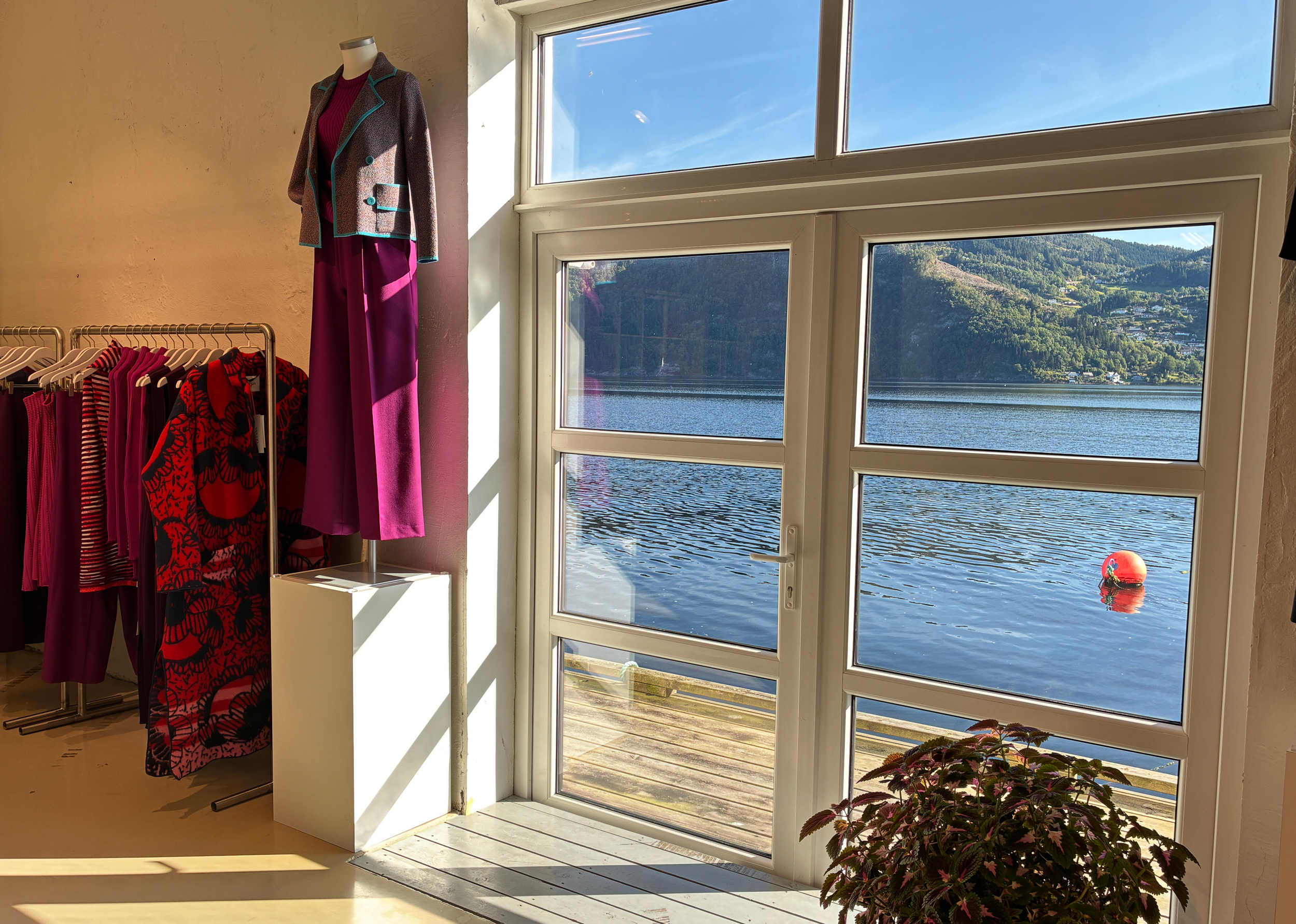 A view from the interior of the Oleana store, looking out at the fjord.