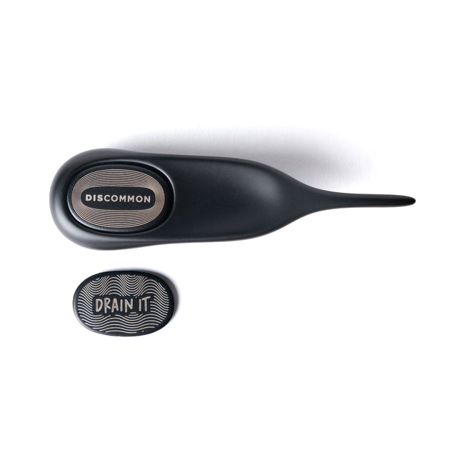 Discommon'S Divot Took, comes in three finishes and has a single divot prong, and a removable ball marker