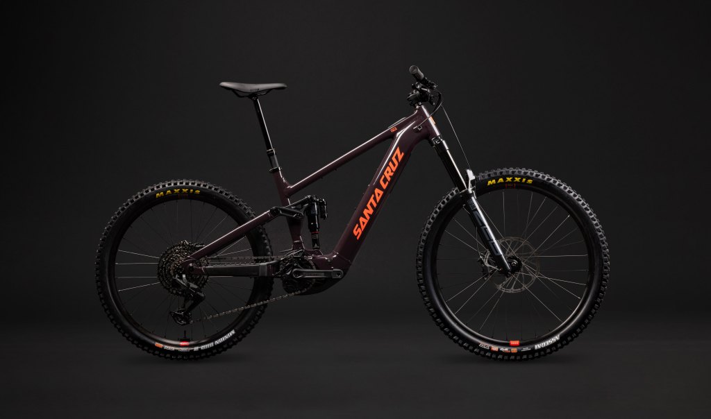 A profile view of the Santa Cruz Vala Alu 70 bike on a dark gray background.