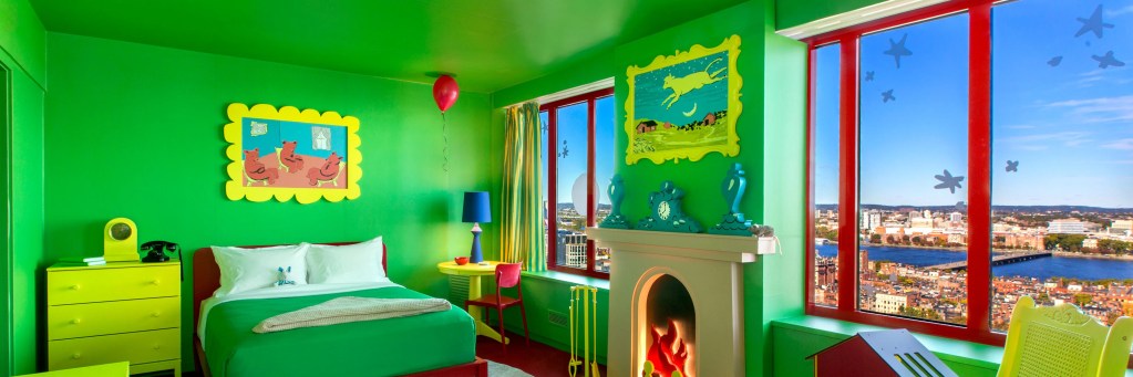 The Goodnight Moon suite at the Sheraton Boston shows the brightly colored room with details from the book