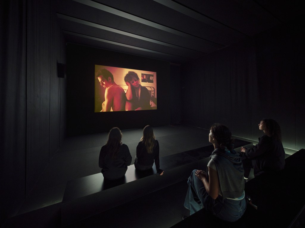 The interior of The Ballad of Sexual Dependency room at Nan Goldin's exhibition at Pitelli HangarBicocca.