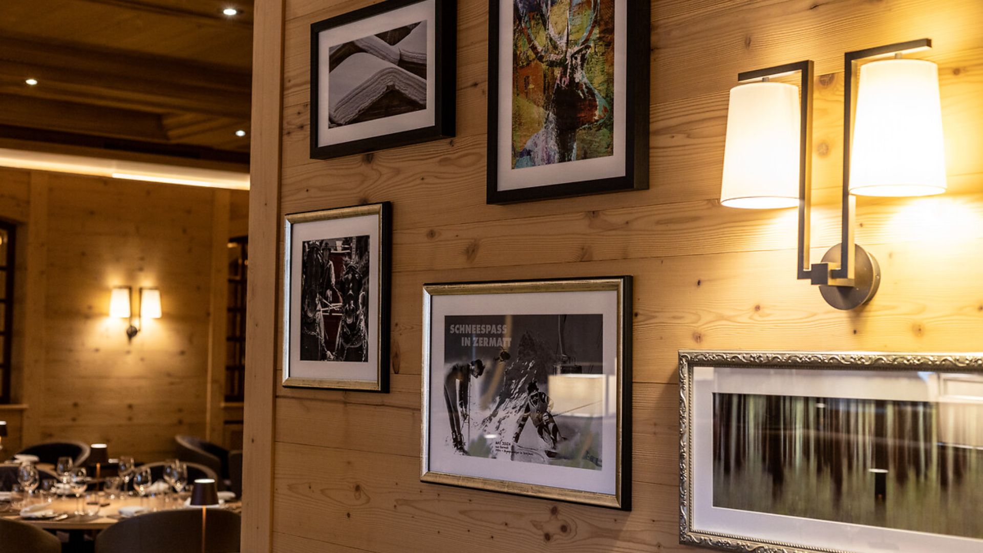Historic framed photos at Grill Le Cervin.