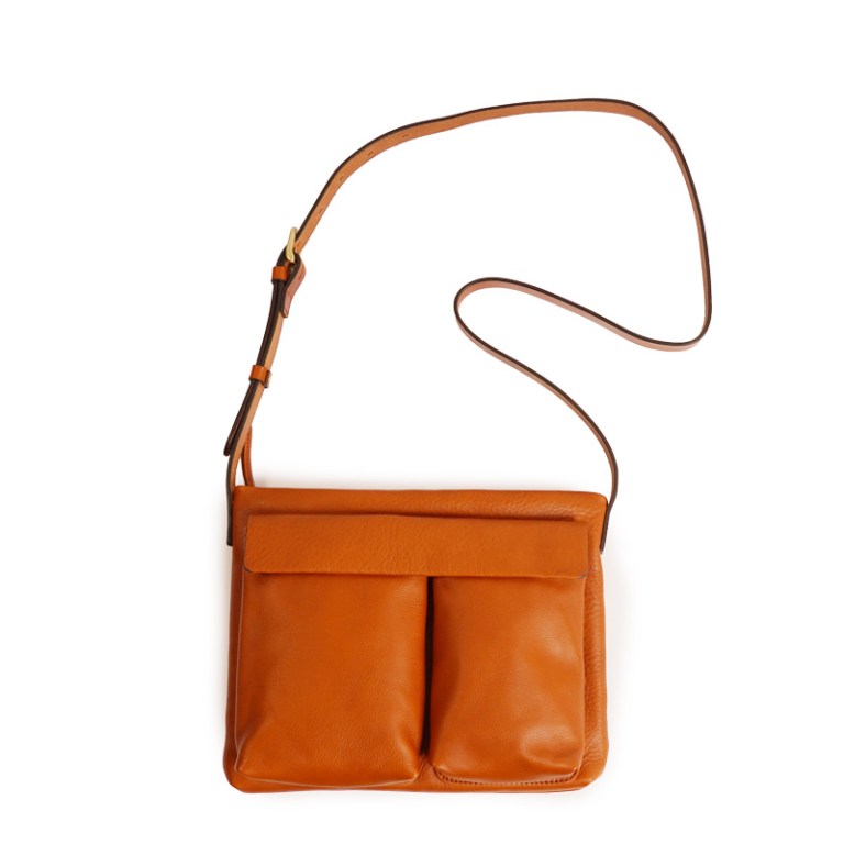 Slow & Co's Helmet Shoulder Bag in than leather shown on a white background