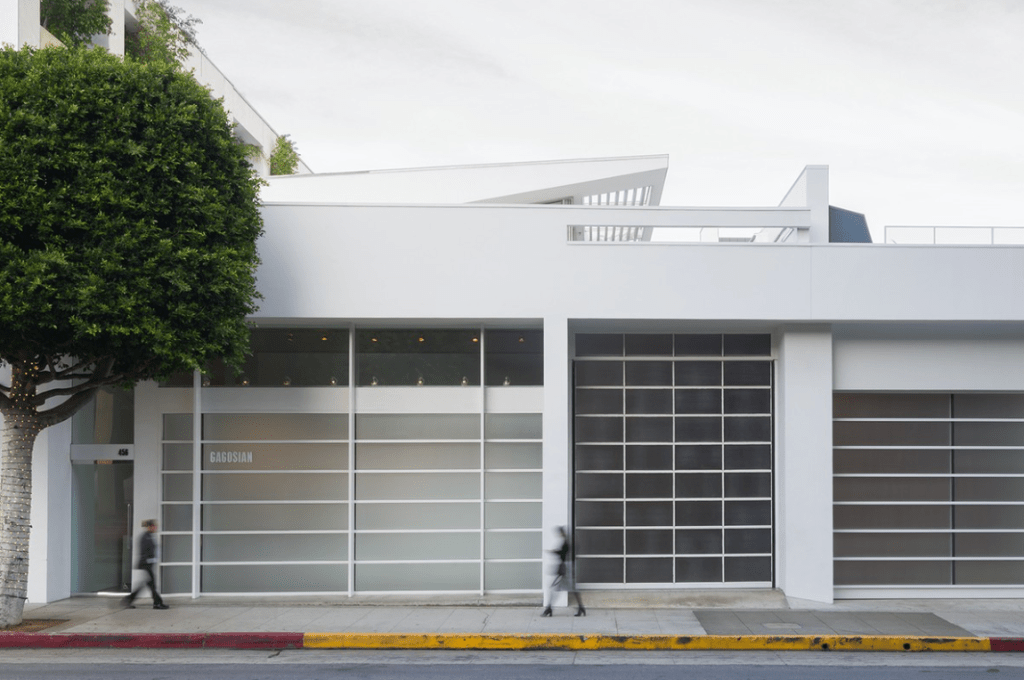 The exterior street view of the Gagosian in Beverly Hills with a person walking by.