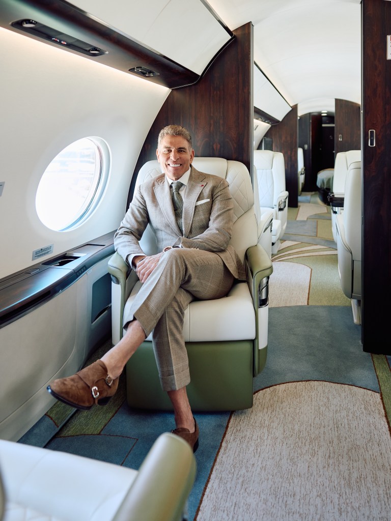 Flexjet's Chairman Kenn Ricci, seated in a Flexjet Gulfstream G700