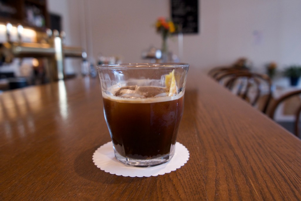 An NA Espresso Old Fashioned made with rye-barrel aged maple syrup and orange bitters at Patron Saint.