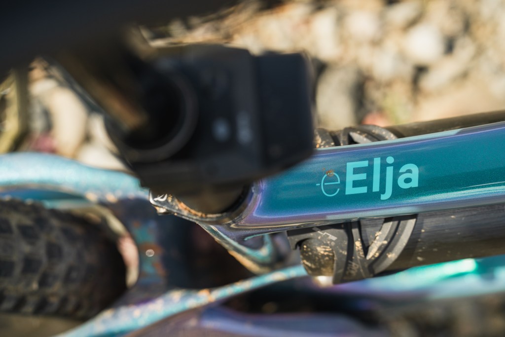 A detail of the Lauf eElja logo on the bike frame.