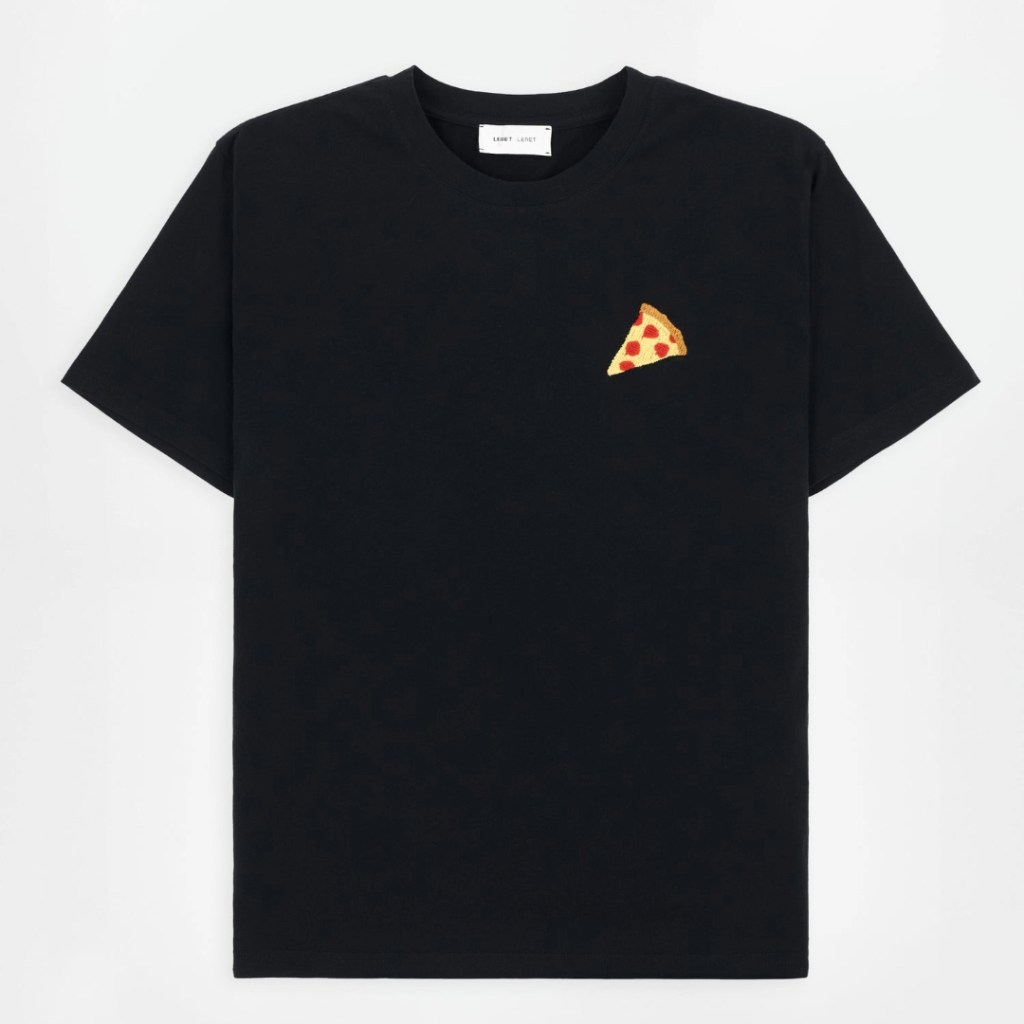 A black short sleeve t-shirt with an embroidered slice of pizza on the front on a plain background