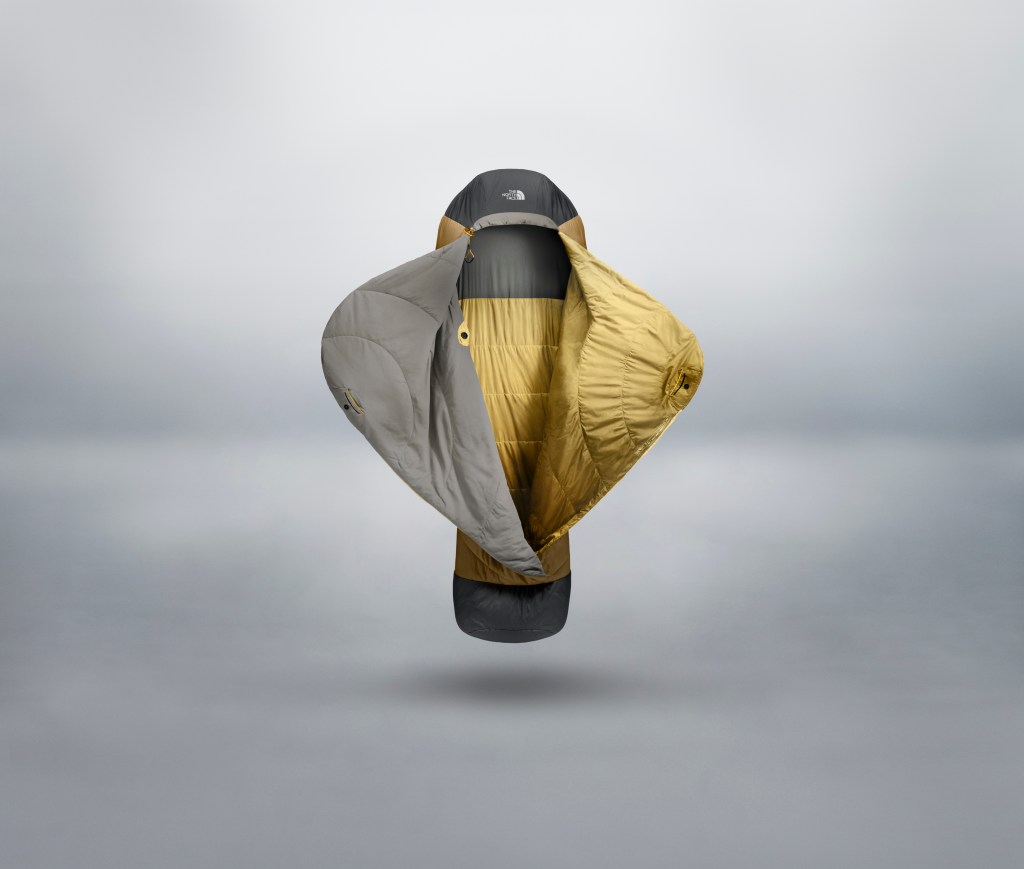 A pulled back shot of The North Face Universal  One Bag, floating over a gray background.