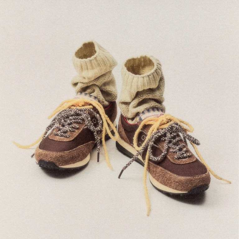 A front view of the ESTUDIO NIKSEN X SAUCONY TRAINER 80