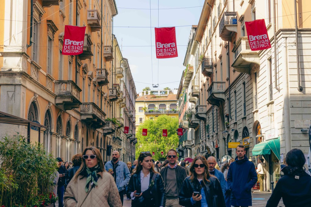 People walking on a street in Milan's Brera district