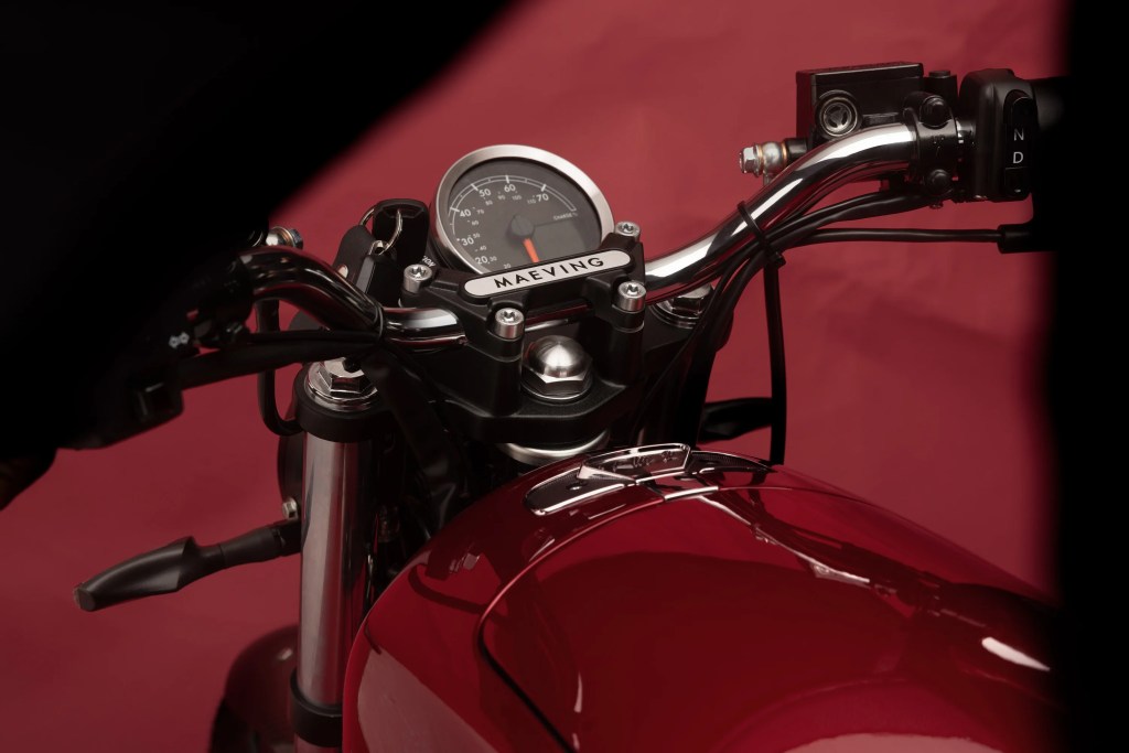 A detail of the Maeving RM2's handlebar and speedometer display.