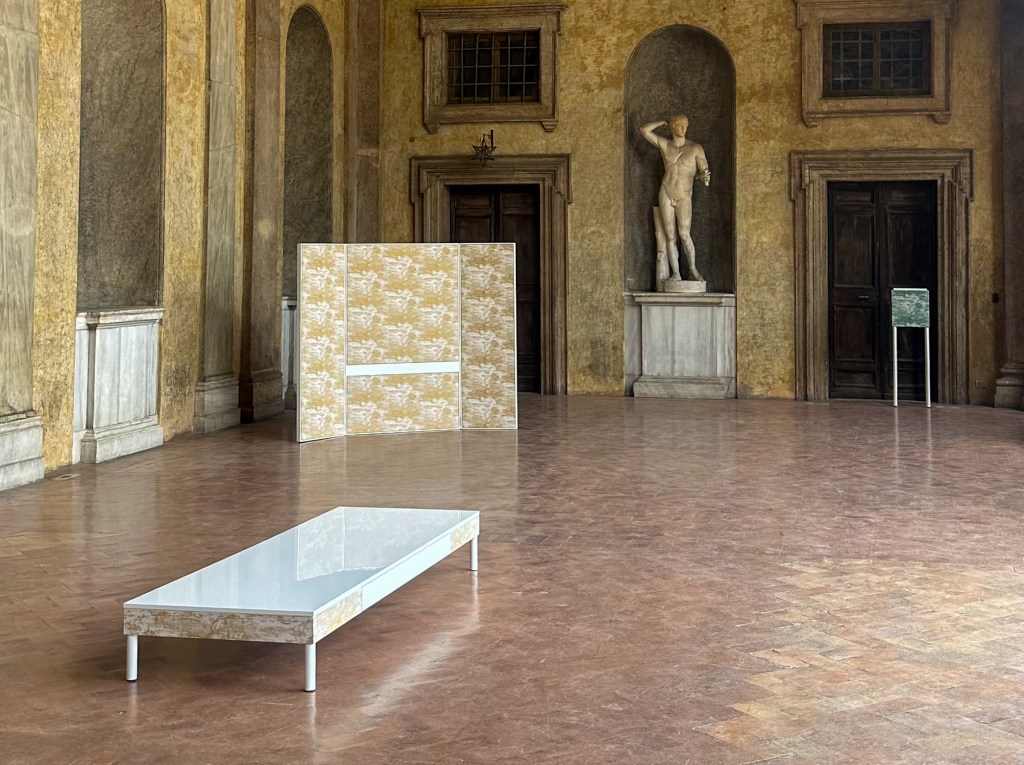 A pulled back shot of three Francesco Balzano pieces of furniture in a