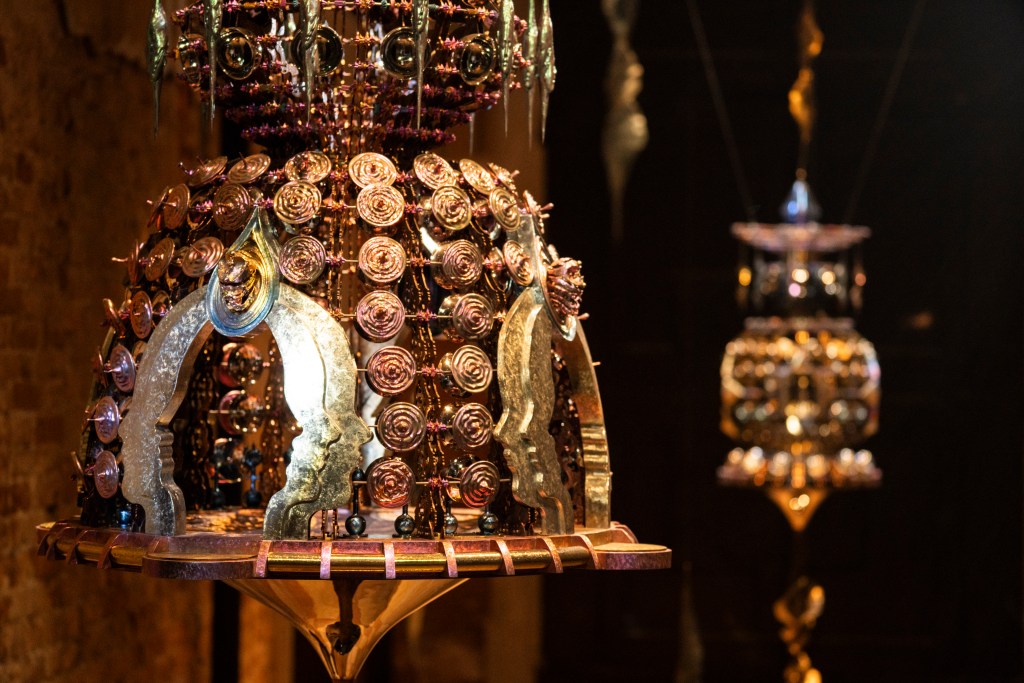 A detail of two sculptures of Vessels of Other Worlds by Wallace Chan.