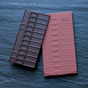A package and bar of Éclat Chocolate's 65% dark chocolate bar, inspired by the shape of the windows in Frank Lloyd Wright's famous Fallingwater House