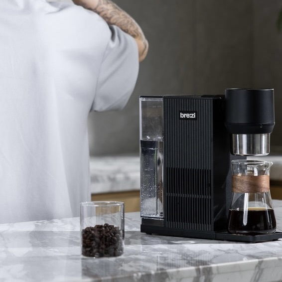 The Brezi cold brew coffee maker, side view, on a counter