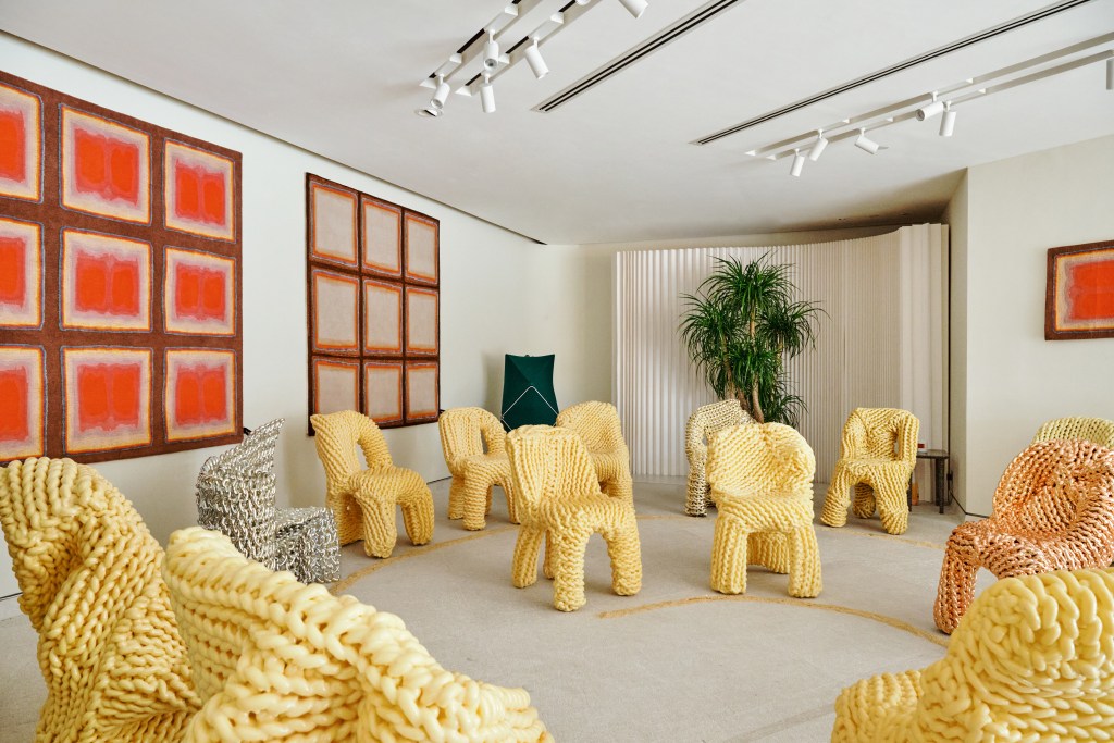 An installation view of Sequence - A Listening Room featuring chairs and rugs designed by Kwangho Lee.