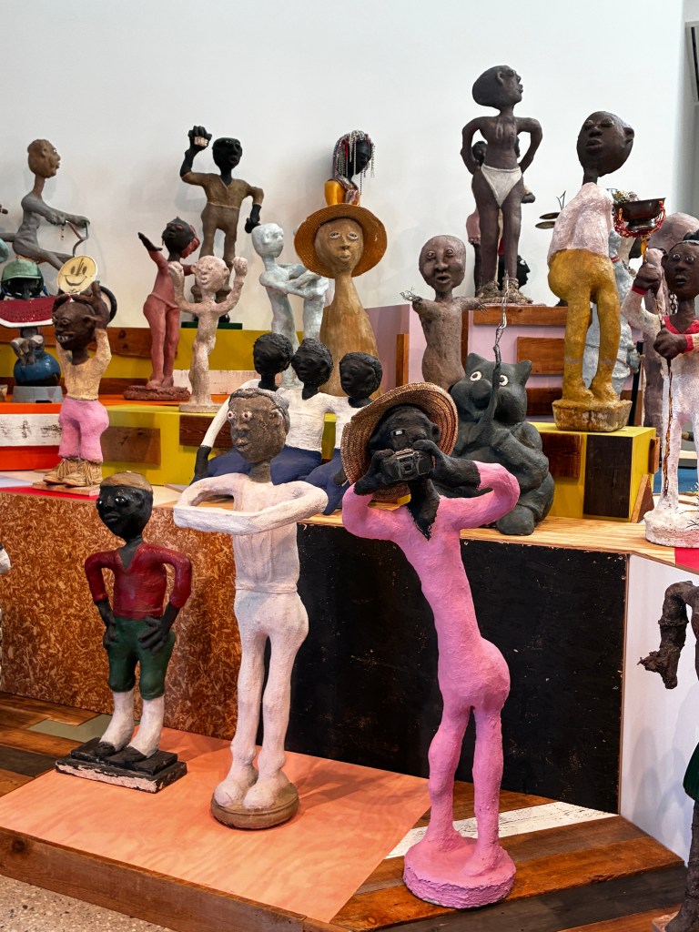 A detail of figurative and colorful sculptures by Dr. Charles Smith.