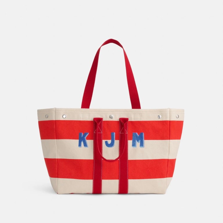 An Alex Mill Perfect Weekend Tote in red and white shown with two-tone monogram