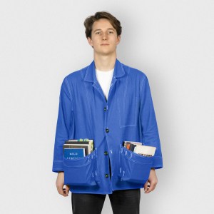 The Slow Learner Dust Jacket, shown in blue, on a male model