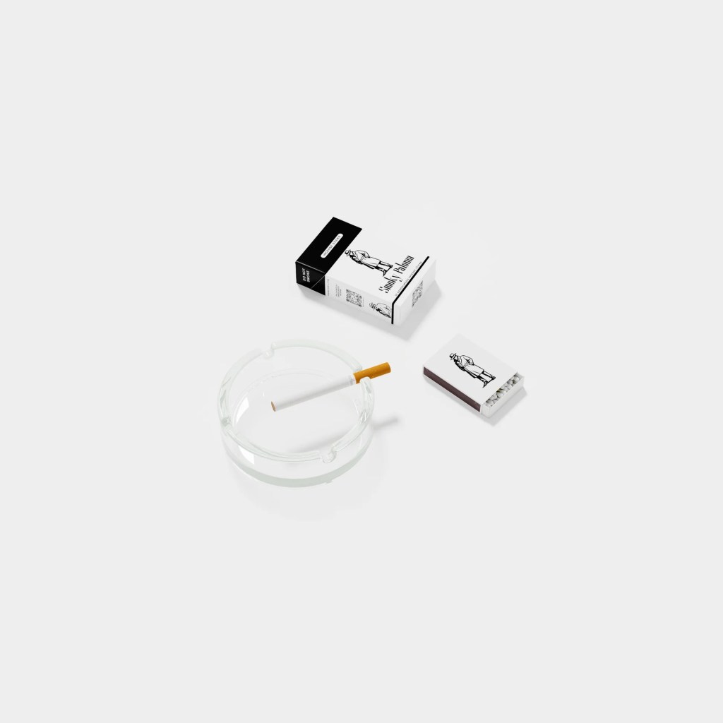 A box of Smoky Paoloma's incense, which looks like a pack of cigarettes, is shown with one cigarette-looking incense stick in an ashtray, and a mathbox