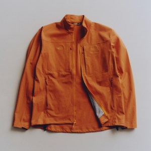 ARC'TERYX × BEAMS Anniversary Collection Gamma Jacket in orange on a plain background
