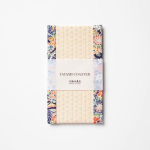 A rectangular shaped tatami mat used for mobile phones with a patterned fabric border