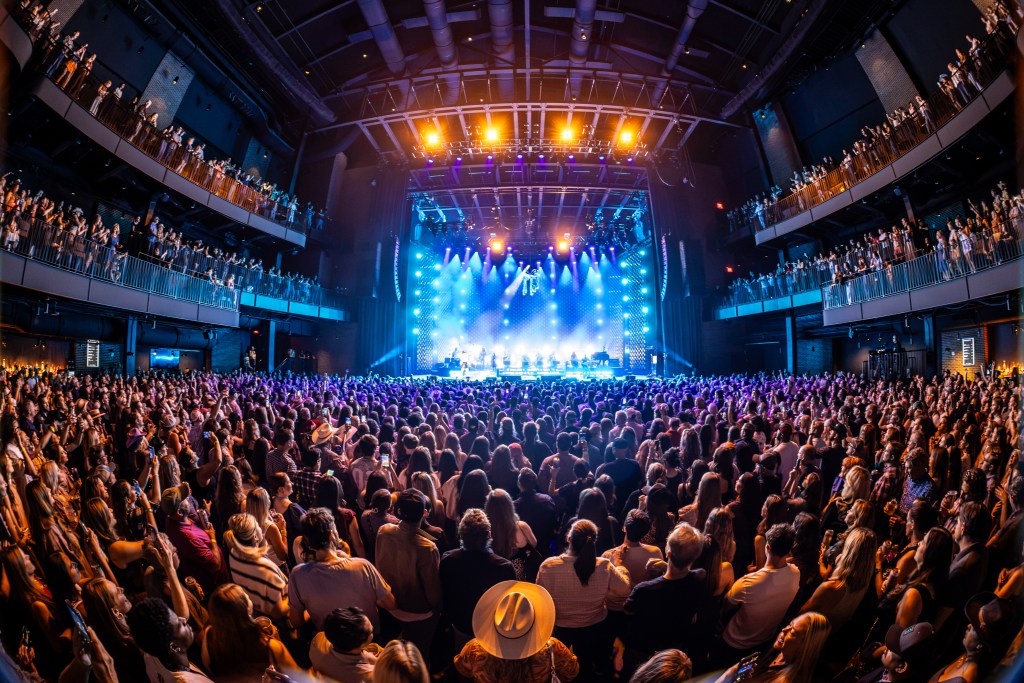 A view looking towards the stage at The Truth, shot from the back of the crowd.